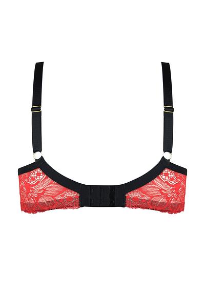 Biustonosz miękki wykonany z beżowej siatki oplecionej delikatną, czerwoną koronką.
 Miseczki dopasowują się do kształtu biustu, jednocześnie zapewniając mu odpowiednie wsparcie. Delikatna koronka ozdabia dolną część miseczki, dodając mu subtelności i kobiecego uroku, jednocześnie zdobiąc także górną część, co nadaje mu wyjątkowego, stylowego wyglądu.
Obwód z solidnej elastycznej siatki, na którą naszyta została koronka, brak bocznych fiszbin.
Ten model został zaprojektowany z myślą o Paniach z większym lub średnim biustem. Dzięki zastosowanym cięciom i wysokiej jakości materiałom gwarantuje doskonałe podtrzymanie biustu, zapewniając jednocześnie komfort noszenia przez cały dzień. Jego wyjątkowy design sprawia, że jest idealnym wyborem dla kobiet ceniących sobie zarówno funkcjonalność, jak i wyrafinowany kobiecy styl.
Konstrukcja-MS1DEZIRO
Skład surowcowy: 85% Poliamid, 10% Elastan, 5% Poliester.
 