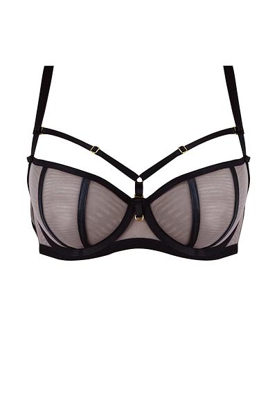 Efektowny biustonosz miękki o kroju balkonetki, miseczki wykonane z czarnej siatki, na którą naszyta została siatka w kolorze mokka.
Satynowe lamówki przykrywają pionowe cięcia.
Konstrukcja doskonale wyeksponuje biust a ozdobne paseczki pięknie ozdobią dekolt, ozdobne paseczki w dekolcie odpinają się.
Skład surowcowy: 85% Poliamid, 10% Elastan, 5% Poliester