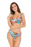 Klasyczny fason i kolorowy print to idealne połączenie!
Figi kąpielowe ze sznureczkami na bokach, które można dowolnie regulować sprawiając, że fason może być mniej lub bardziej zabudowany.
Skład surowcowy: 80% Poliamid, 20% Elastan
 