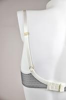 Biustonosz miękki w konstrukcji COSMO, która charakteryzuje się pełną miską, która okala pierś i bardziej ją zakrywa w górnej części.
Dolna część miseczki z siatki, wierzch z haftu w pomarańczowe kwiaty na szarym tle, ramiączka i taśmy w kolorze białym. Obwód ze stabilnej siatki zapewni maksymalne podtrzymanie biustu.
Konstrukcja jednocześnie stabilna i lekka skierowana dla pań ze średnim, dużym i bardzo dużym biustem.Skład: 85% Poliamid, 10% Elastan, 5% Poliester.
 