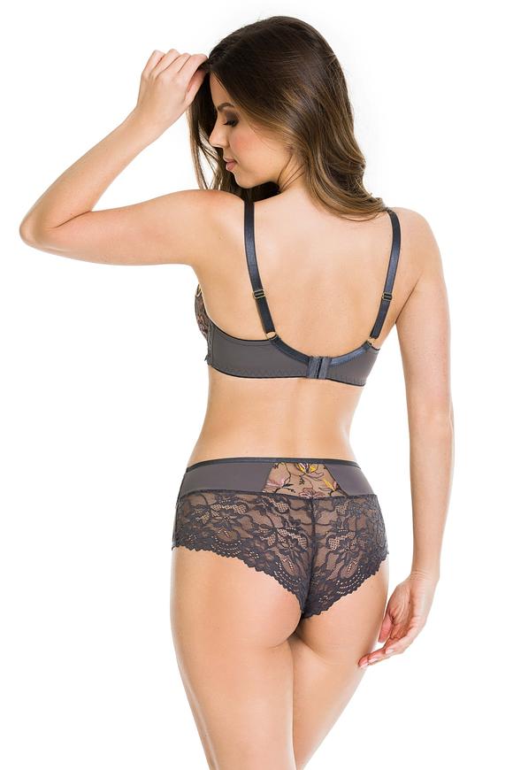 Biustonosz miękki  z fiszbinami.
Miseczki z beżowej siatki, na którą naszyty jest wzorzysty plen-motyw kwiatowy na grafitowym podkładzie.
Boczki z mikrofibry-wzmocnione fiszbiną, grafitowe ramiączka, bawet z koronki, środek zdobi zółta kokardka.
Pewna i sprawdzona konstrukcja z modelu Deziro dedykowana dla średnichi dużych biustów.
Skład surowcowy: 85%Poliamid, 10% Elastan, 5%Poliester.
 