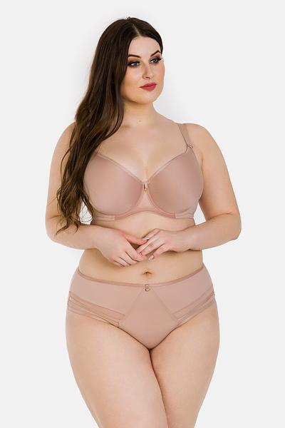 


Biustonosz typu SPACER, jego główne cechy to lekkość, oddychalność oraz trójwymiarowa struktura wykonana z materiału zwanego "spacer fabric". Miski biustonosza są stworzone z tej specjalnej tkaniny, która składa się z dwóch cienkich warstw połączonych włókniną dystansową. To zapewnia przepływ powietrza i lekkość materiału, co może być szczególnie komfortowe w codziennym noszeniu.
Dodatkowo, biustonosz posiada wszyty tiul w okolicach mostka, co może dodatkowo zwiększać komfort noszenia. Na środku biustonosza znajduje się element biżuterii, co dodaje mu estetyki i elegancji. Miski są dodatkowo wzmocnione bocznym panelem z tiulu, co może zapewniać dodatkowe wsparcie i kształtowanie biustu.
Warto zauważyć, że biustonosz nie posiada bocznych fiszbin, co może być cenione przez osoby, które preferują wygodę i naturalne dopasowanie. Boki i tył biustonosza wykonane są z mikrofibry, co może dodatkowo przyczynić się do komfortu noszenia.
Skład: 85% poliamid, 10% elastanu i 5% poliestru. 
Te składniki materiału są powszechnie używane w produkcji bielizny, zapewniając elastyczność, trwałość i komfort noszenia.



 