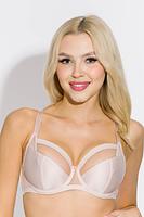 Ten miękki biustonosz bazuje na sprawdzonej konstrukcji modelu Deziro, co zapewnia nie tylko wygodę, ale także solidność podparcia. Miseczki wykonane są z simplexu, co gwarantuje maksymalne podtrzymanie biustu i zapewnia stabilność. Góra biustonosza wykonana jest z beżowej siatki, zakończonej taśmą.
Stabilny obwód biustonosza zapewnia pewne dopasowanie i komfort użytkowania przez cały dzień. Dzięki połączeniu solidnej konstrukcji, wygodnych materiałów i eleganckiego wykończenia,  jest doskonałym wyborem na co dzień, łącząc efekt uniesienia i zebrania biustu z wygodą noszenia przez cały dzień.
Skład: 85% Poliamid, 10% Elastan, 5% Poliester