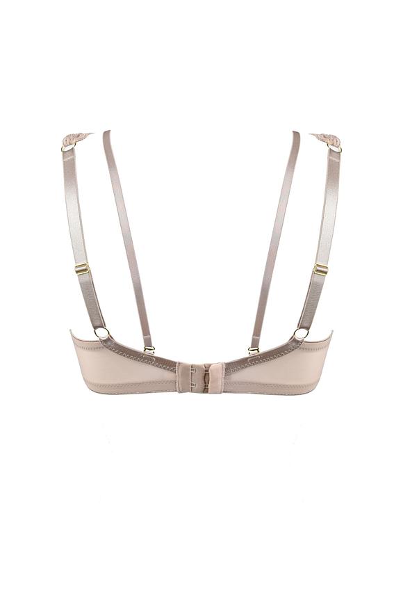 Biustonosz o kroju bralette, miękki z fiszbinami.
Miseczki wykonane zostały z siatki pokrytej bogatą koronką. W dekolcie znajduje się odpinany straps przechodzący na plecy.
Konstrukcja lekka, idelalna na lato, kształtuje biust w naturalny sposób.
Obwód z siatki, model nie posiada bocznej fiszbiny.
Skład surowcowy: 85% Poliamid, 10% Elastan, 5% Poliester.